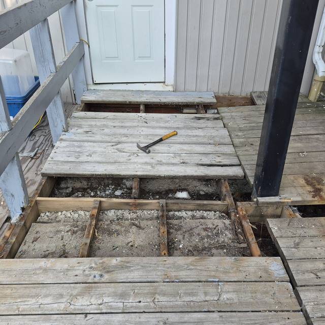 Back landing: rotten boards before, new ramp and landing after (before) — Coghill Construction & Renovations