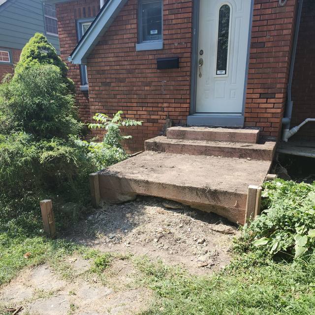 Front steps: bare landing before, new wooden steps after (before) — Coghill Construction & Renovations