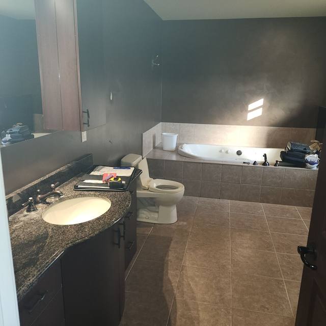 Bathroom, dark tile — Coghill Construction & Renovations